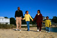 Family walking on the beach