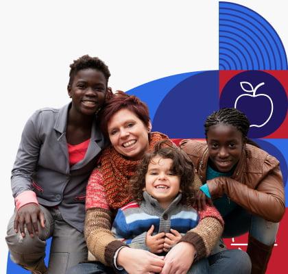 A group of people sitting together smiling.