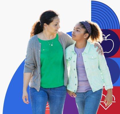 A mom walks with her arm around her daughter’s shoulders while they talk.