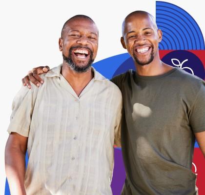 Two men smiling. 
