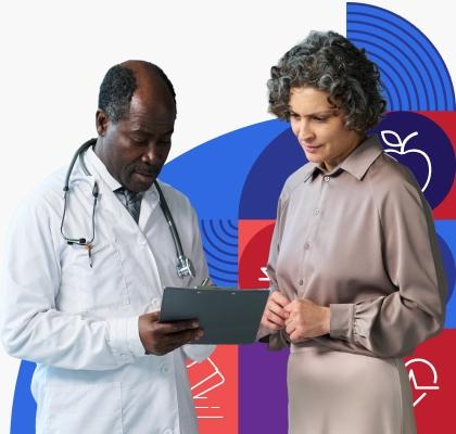 A Black male doctor wearing a white lab coat shows a white woman information on a clipboard.