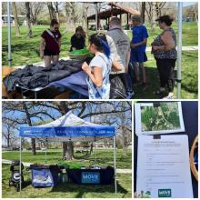 People gather around a table with Move Your Way materials on it Caption: Sharing information at the Move Your Way Stroller 5K