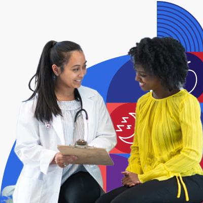 A woman talking to a health care provider.