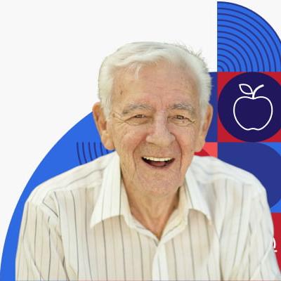 Older man smiling.