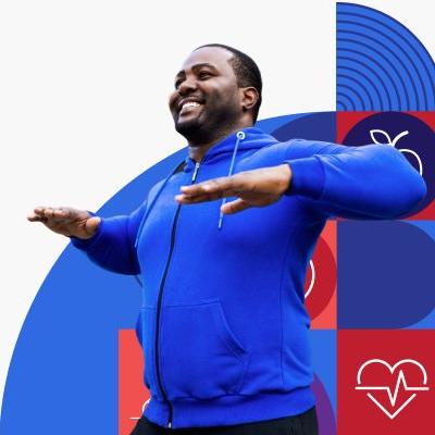 A man in a blue hoodie exercising.