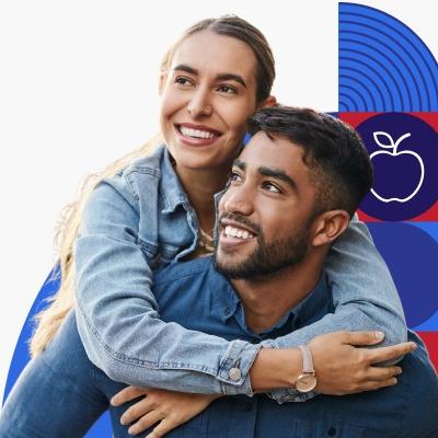 A man and woman smiling