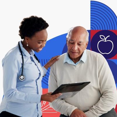 A female provider with brown skin and short dark hair goes over information with an older male patient.