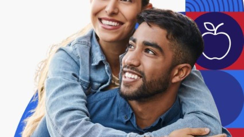 A man and woman smiling